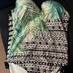 Swimsuit 
Size Small/medium
Color:peacock colors